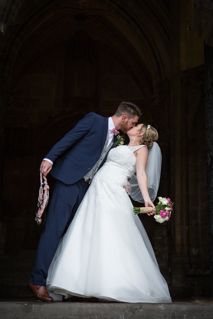 Wedding photography St Mary Redcliffe Church Bristol, bride and groom on the church steps